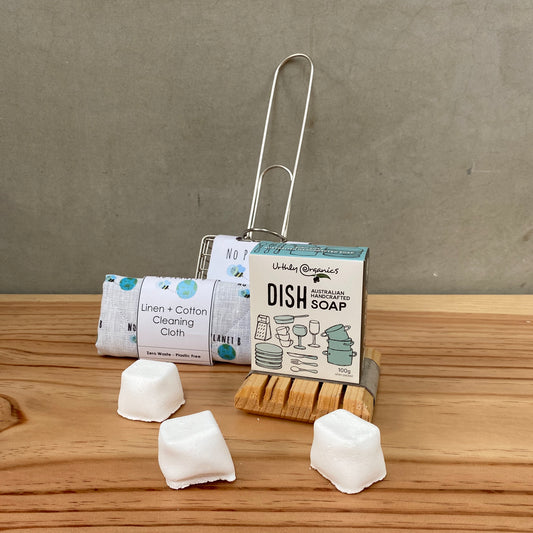 Plastic-free dish products. Dish soap, kettle cleaners, wooden soap holder, dish swisher and cleaning cloth